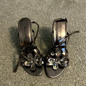 Worn once grey heels size 7.5